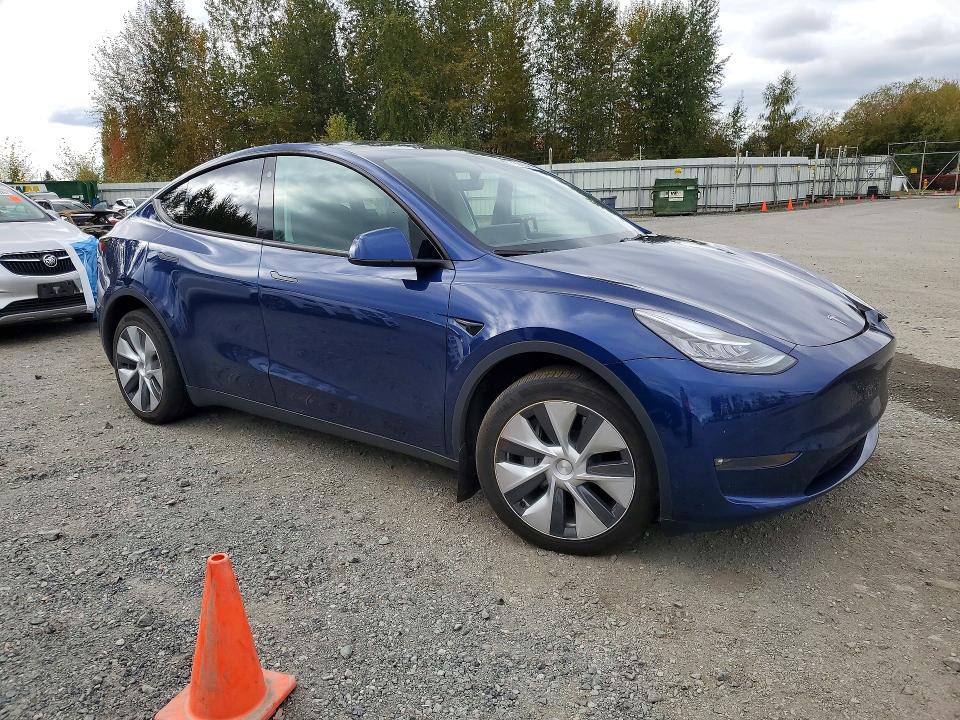 Снимка 4 от търг – 2022 TESLA MODEL Y с VIN 7SAYGAEE9NF506401