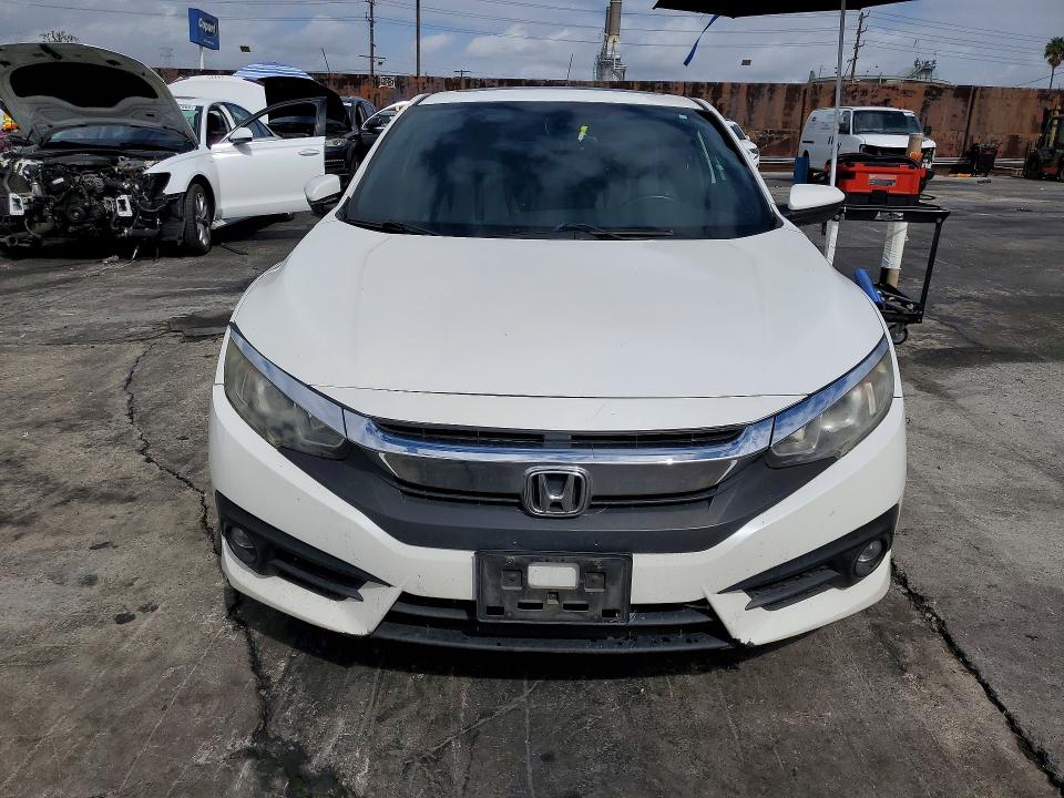 Photo 5 from auction – 2016 HONDA CIVIC with VIN 2HGFC3B72GH360035