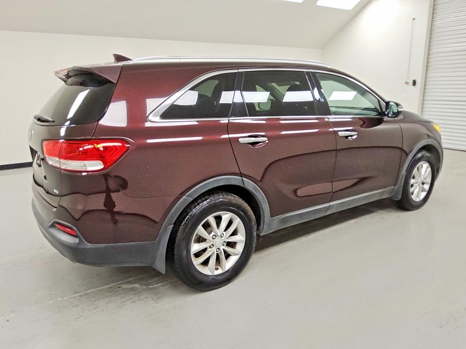 Photo 3 from auction – 2016 KIA SORENTO with VIN 5XYPG4A53GG011140