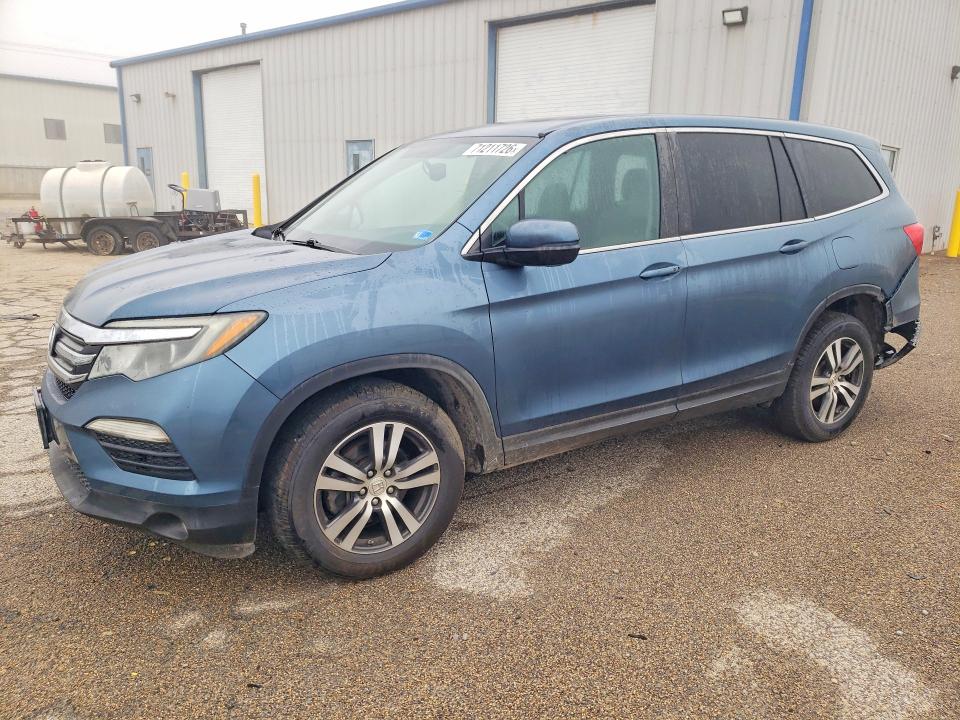 HONDA PILOT 2016 with VIN 5FNYF6H57GB023985 - Photo from auction