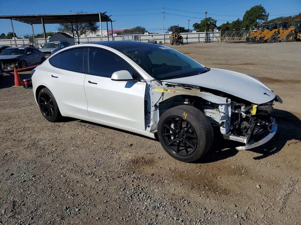 Photo 4 from auction – 2022 TESLA MODEL 3 with VIN 5YJ3E1EA1NF110568