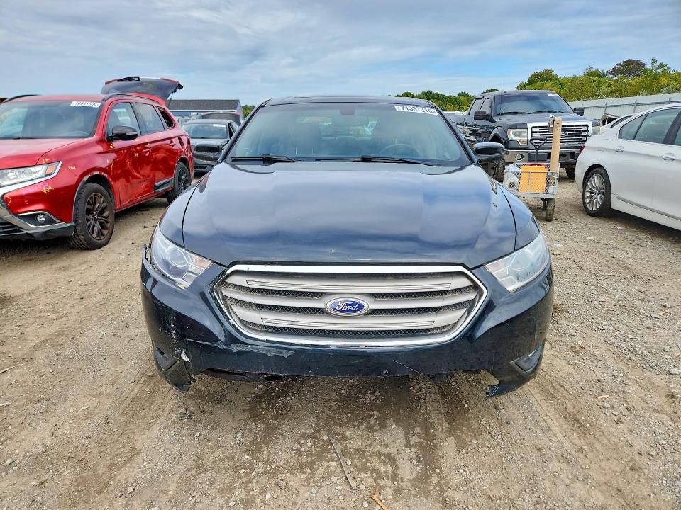 Photo 5 from auction – 2014 FORD TAURUS with VIN 1FAHP2H81EG177438
