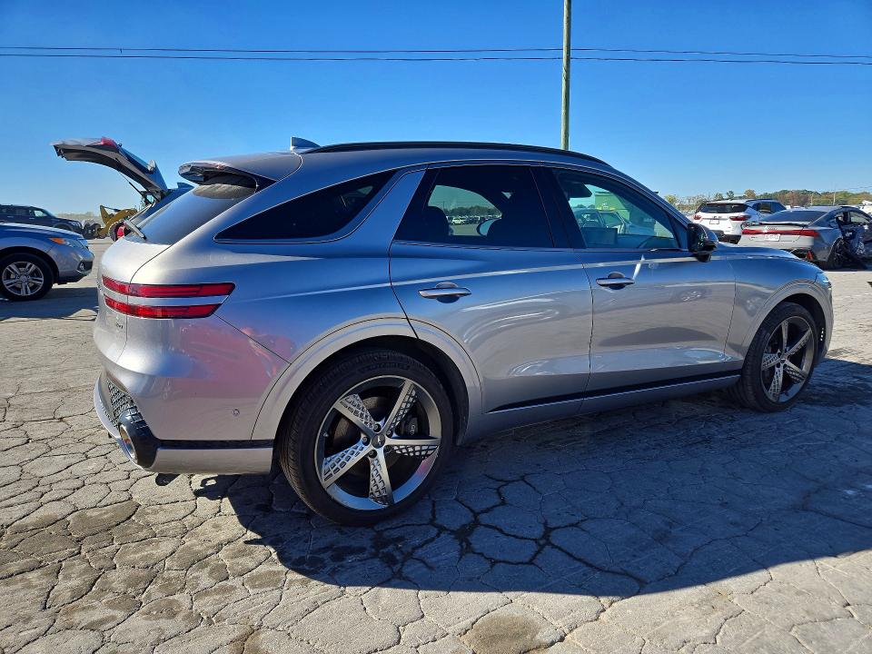 Photo 3 from auction – 2023 GENESIS GV70 with VIN KMUMADTB9PU125596