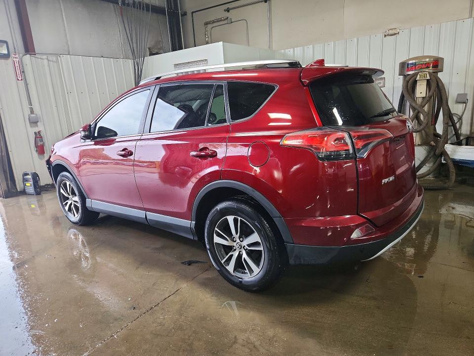 Photo 2 from auction – 2018 TOYOTA RAV4 with VIN 2T3RFREV6JW853594