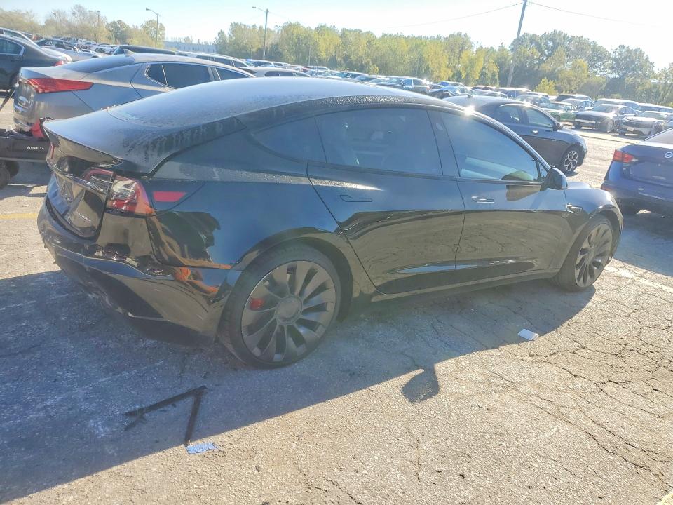 Снимка 3 от търг – 2023 TESLA MODEL 3 с VIN 5YJ3E1EC2PF671981