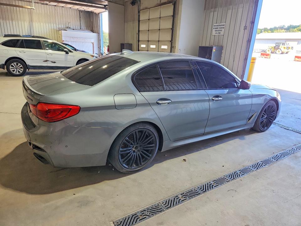 Photo 3 from auction – 2018 BMW M550XI with VIN WBAJB9C57JG463995