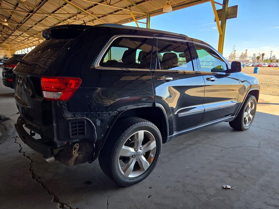 Снимка 3 от търг – 2013 JEEP GRAND CHEROKEE с VIN 1C4RJECT8DC556519