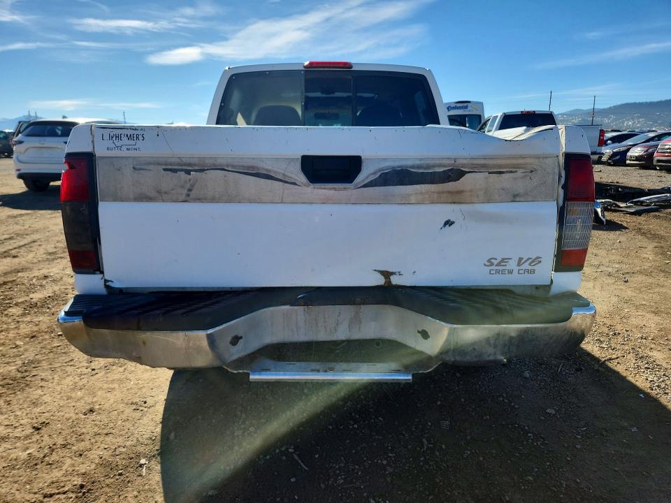 Снимка 6 от търг – 2000 NISSAN FRONTIER с VIN 1N6ED27Y0YC309265