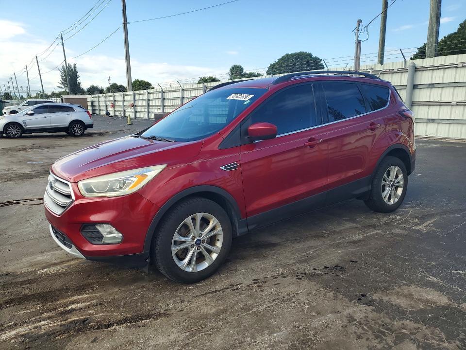 FORD ESCAPE 2017 with VIN 1FMCU9GDXHUD92998 - Photo from auction