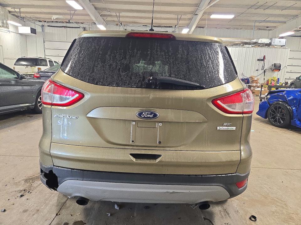 Foto 6 de la subasta – 2013 FORD ESCAPE con VIN 1FMCU0GX1DUD85888