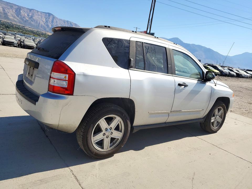 Фото 3 с аукциона – 2009 JEEP COMPASS с VIN 1J4FF47B79D210456