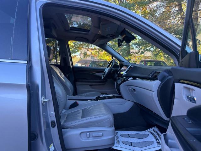 Снимка 5 от търг – 2016 HONDA PILOT с VIN 5FNYF6H07GB018189
