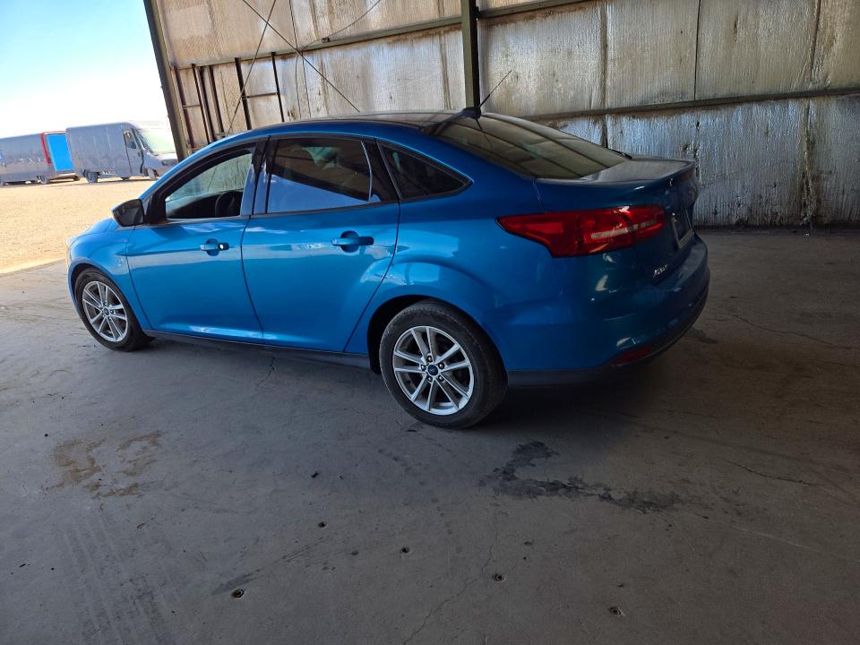Photo 2 from auction – 2016 FORD FOCUS with VIN 1FADP3F21GL395893