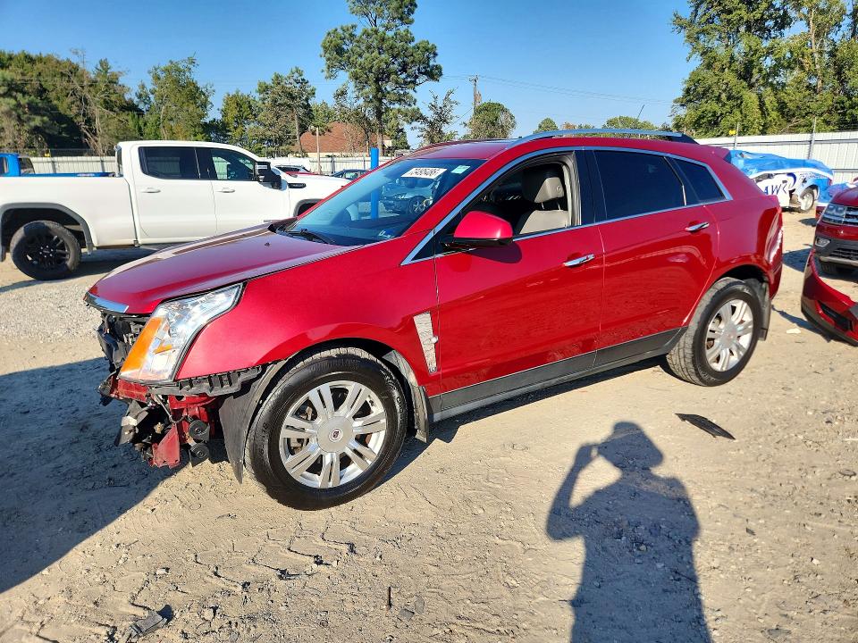 CADILLAC SRX 2012 с VIN 3GYFNAE34CS621401 - Снимка от търг