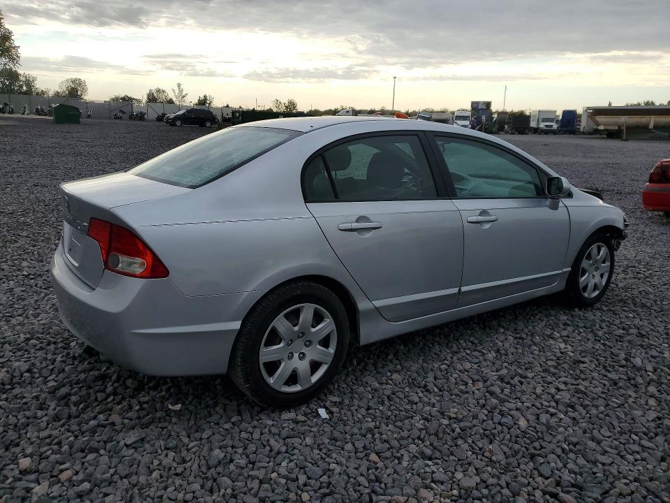 Снимка 3 от търг – 2010 HONDA CIVIC с VIN 2HGFA1F55AH301104
