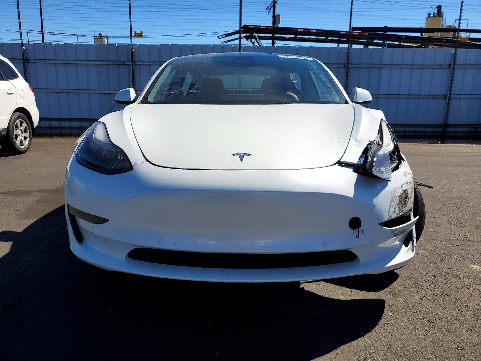 Снимка 5 от търг – 2022 TESLA MODEL 3 с VIN 5YJ3E1EA3NF163515