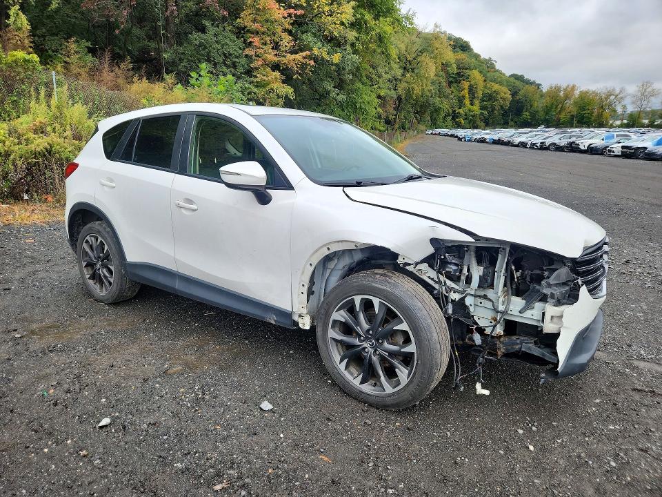 Снимка 4 от търг – 2016 MAZDA CX-5 с VIN JM3KE4DY5G0627571