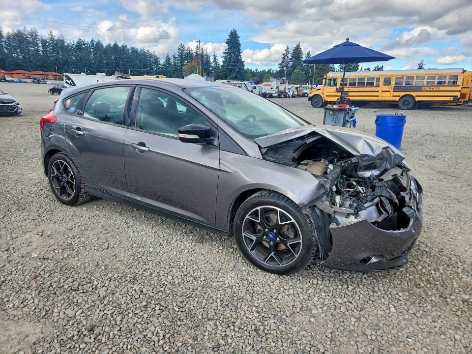 Снимка 4 от търг – 2013 FORD FOCUS с VIN 1FADP3K24DL363618