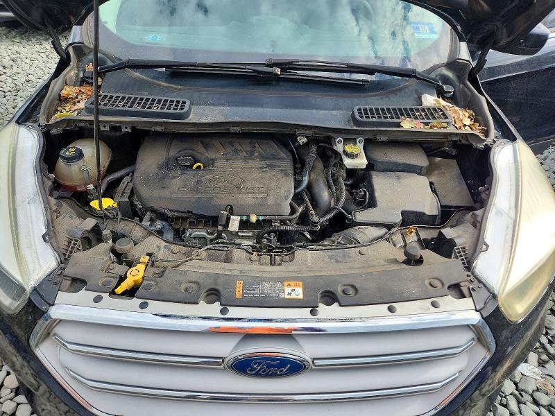 Photo 11 from auction – 2018 FORD ESCAPE with VIN 1FMCU9GD3JUA35300