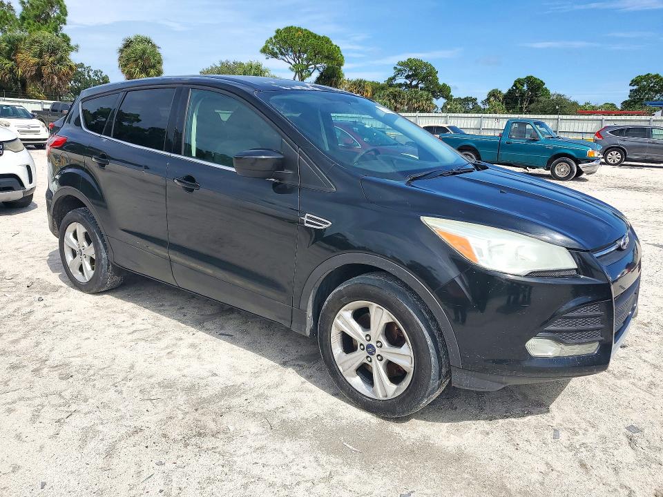Photo 4 from auction – 2014 FORD ESCAPE with VIN 1FMCU9G9XEUB04436
