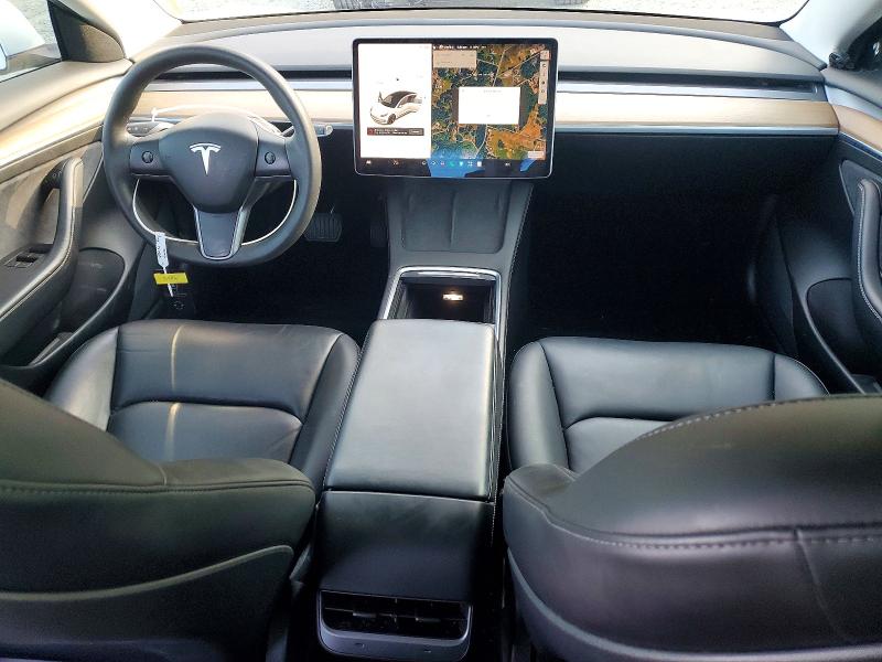Снимка 8 от търг – 2021 TESLA MODEL 3 с VIN 5YJ3E1EA4MF058299