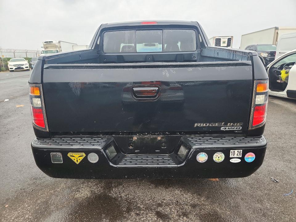 Снимка 6 от търг – 2006 HONDA RIDGELINE с VIN 2HJYK16456H572579