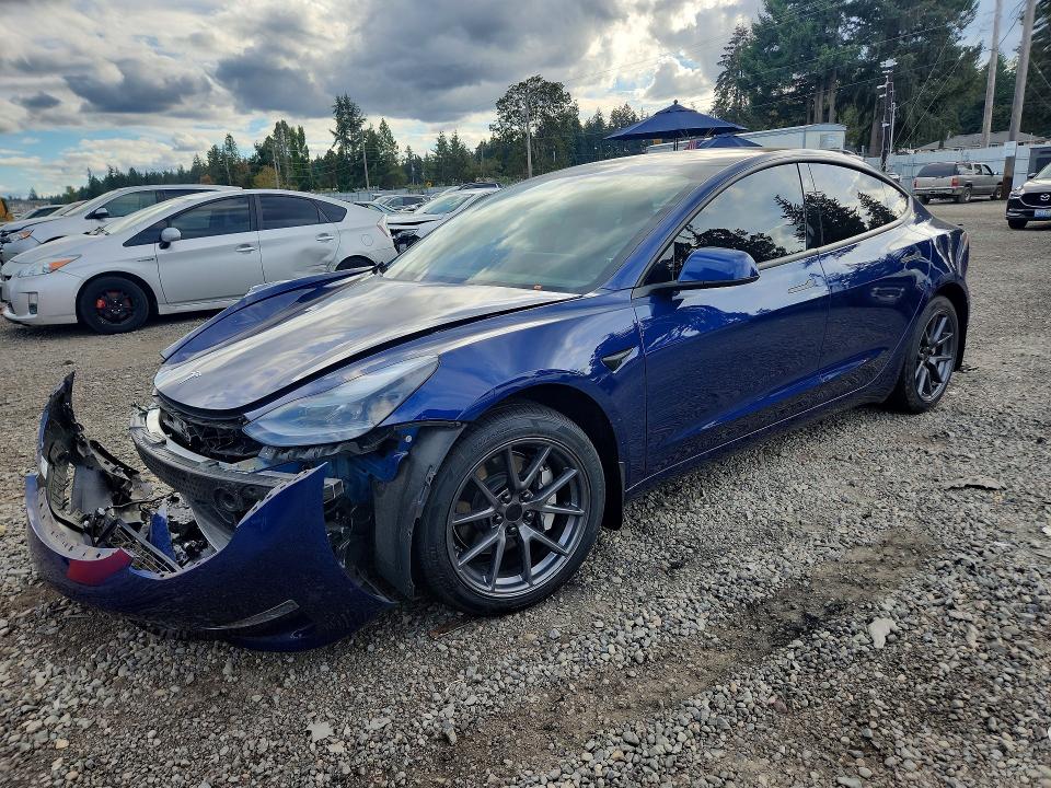 TESLA MODEL 3 2023 с VIN 5YJ3E1EB0PF387417 - Снимка от търг