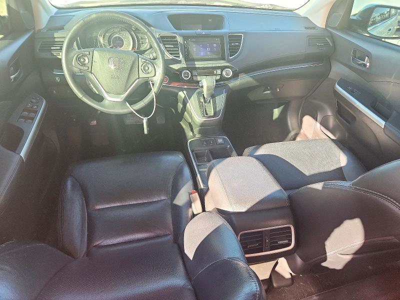 Photo 8 from auction – 2015 HONDA CR-V with VIN 5J6RM4H70FL096234