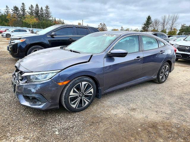 HONDA CIVIC 2018 с VIN 2HGFC1F49JH102638 - Снимка от търг