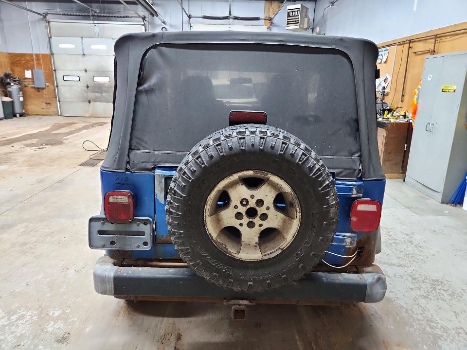 Снимка 6 от търг – 2003 JEEP WRANGLER / TJ с VIN 1J4FA49SX3P331113