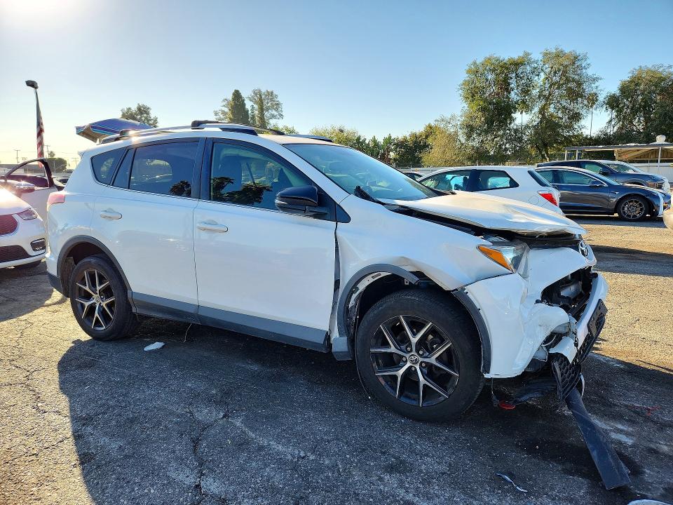 Photo 4 from auction – 2016 TOYOTA RAV4 with VIN JTMNFREV4GJ063345