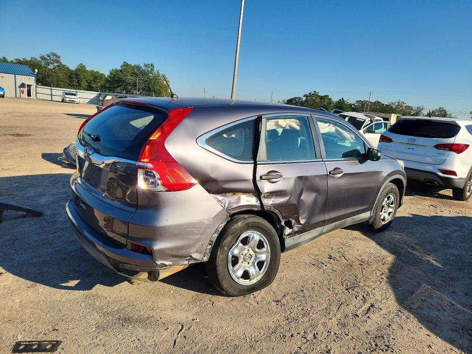 Photo 3 from auction – 2015 HONDA CR-V with VIN 2HKRM3H33FH536447