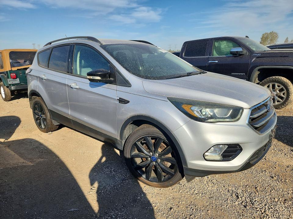 Photo 4 from auction – 2017 FORD ESCAPE with VIN 1FMCU9JD5HUB41699