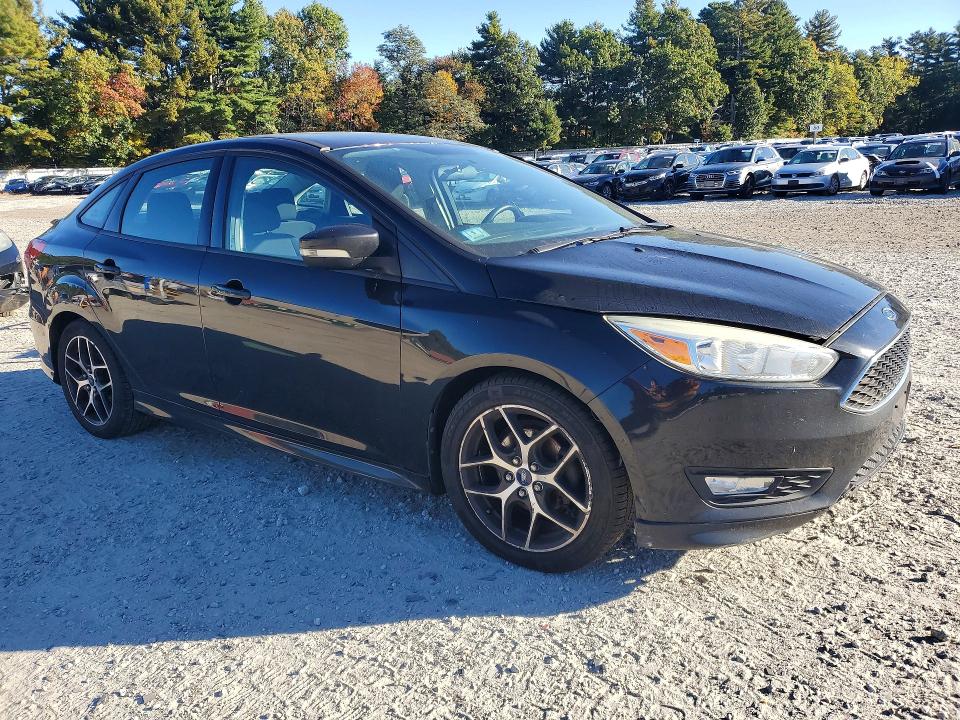 Photo 4 from auction – 2015 FORD FOCUS with VIN 1FADP3F23FL258839
