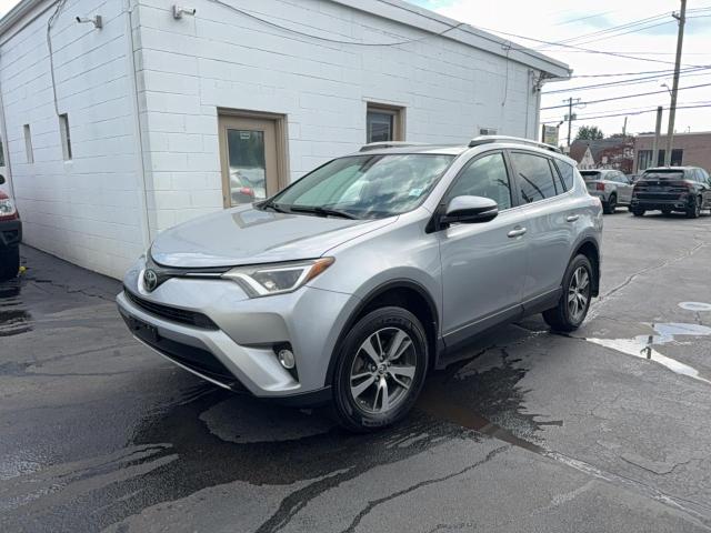Photo 2 from auction – 2017 TOYOTA RAV4 with VIN 2T3RFREVXHW580170