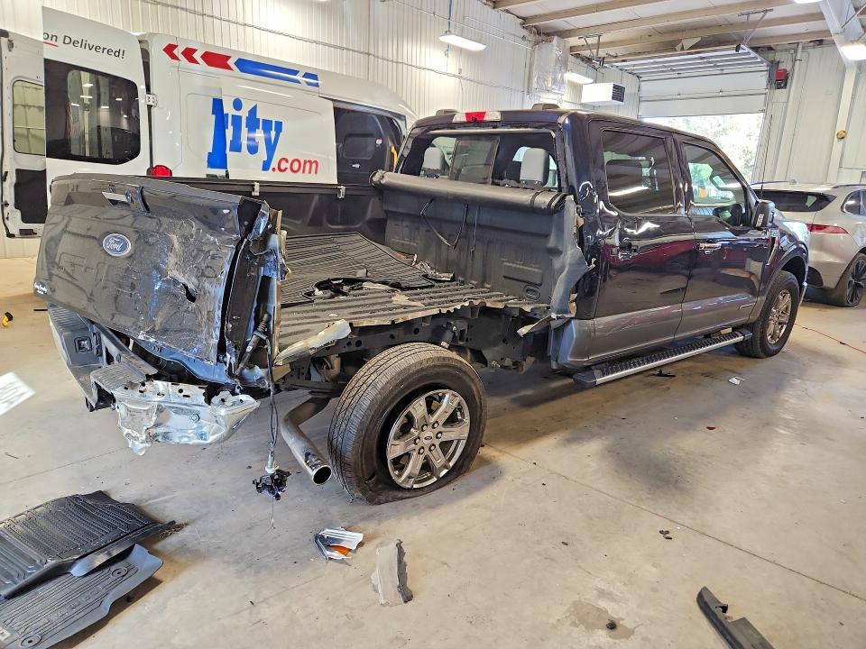 Photo 3 from auction – 2023 FORD F150 with VIN 1FTFW1ED5PFA06670