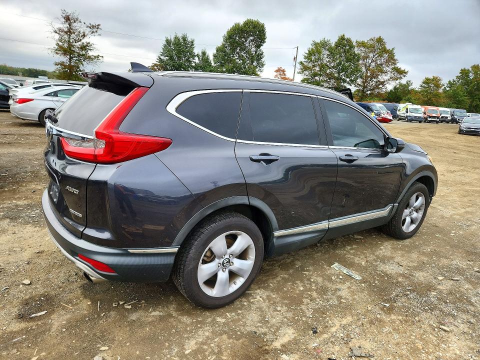 Photo 3 from auction – 2017 HONDA CR-V with VIN 2HKRW2H98HH613941