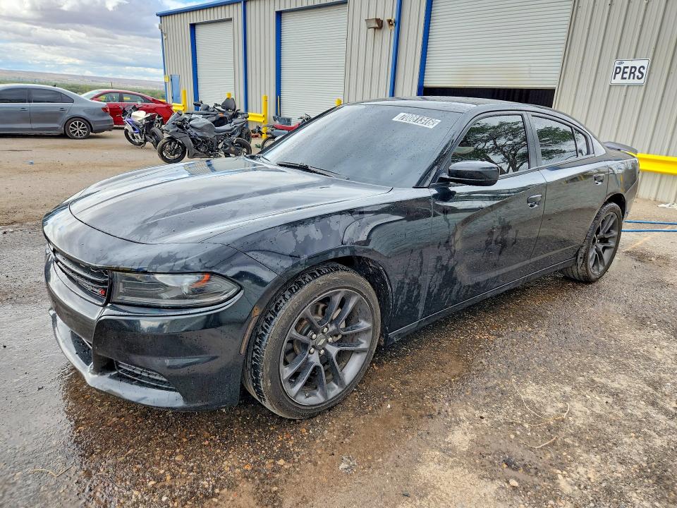 DODGE CHARGER 2022 with VIN 2C3CDXBG2NH129935 - Photo from auction