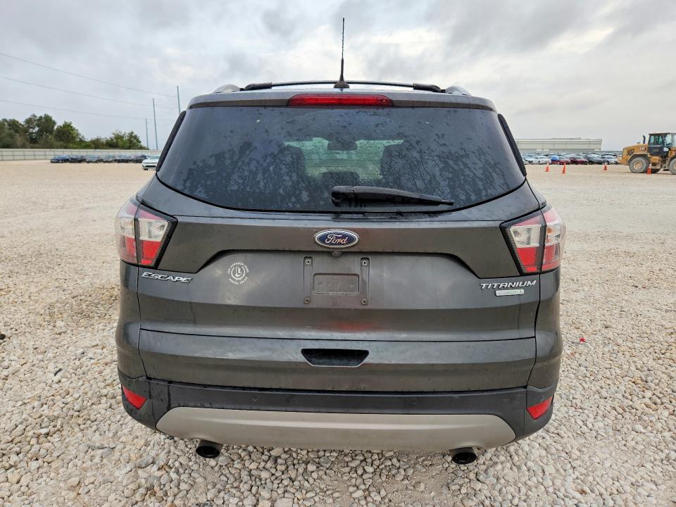 Снимка 6 от търг – 2018 FORD ESCAPE с VIN 1FMCU0J90JUD50202
