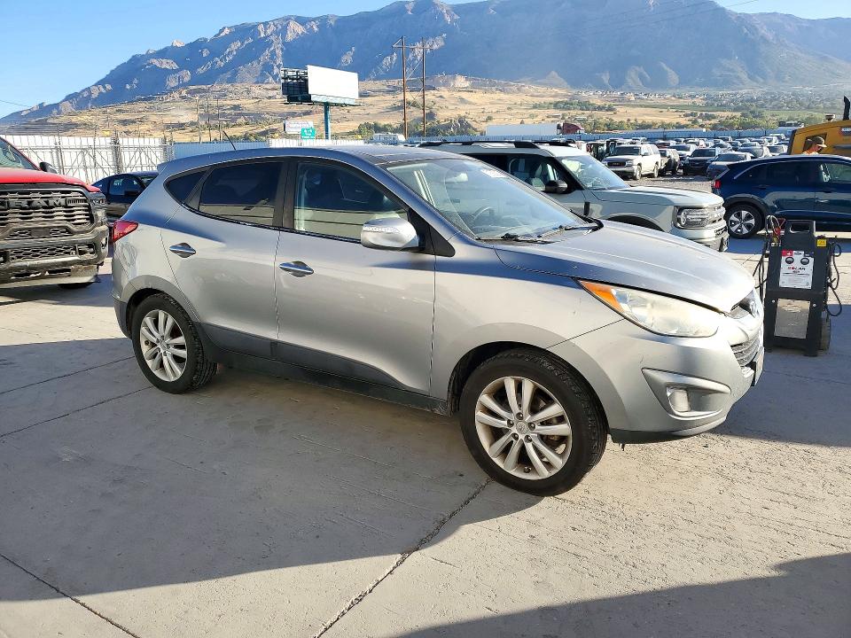 Снимка 4 от търг – 2010 HYUNDAI TUCSON с VIN KM8JUCAC1AU034084
