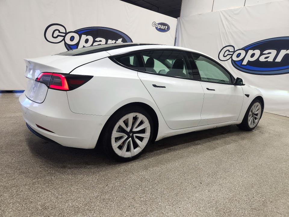 Снимка 3 от търг – 2022 TESLA MODEL 3 с VIN 5YJ3E1EA8NF304336