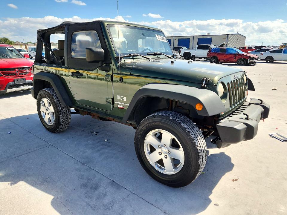 Фото 4 с аукциона – 2009 JEEP WRANGLER с VIN 1J4FA24109L747433