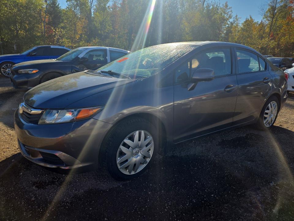 HONDA CIVIC 2012 с VIN 2HGFB2F55CH002993 - Снимка от търг