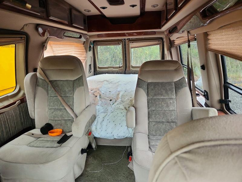 Photo 10 from auction – 2001 FORD ECONOLINE with VIN 1FDPE24L71HB59192