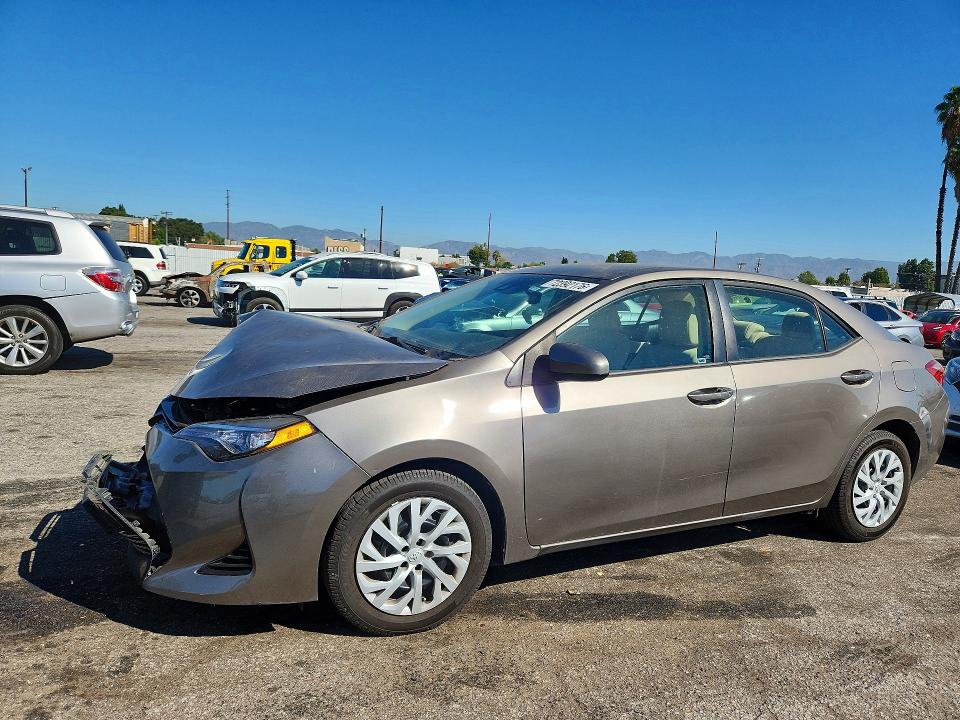 TOYOTA COROLLA 2017 с VIN 5YFBURHE0HP726749 - Снимка от търг