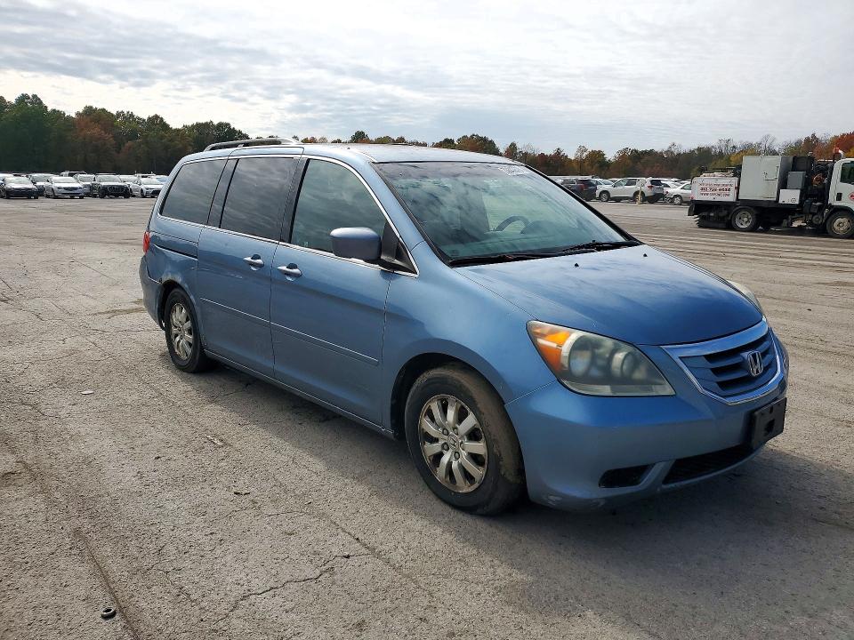 Снимка 4 от търг – 2010 HONDA ODYSSEY с VIN 5FNRL3H46AB075912