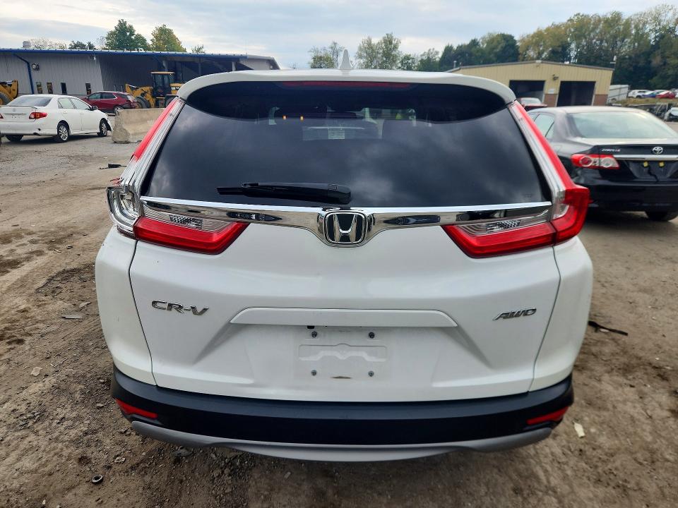Photo 6 from auction – 2019 HONDA CR-V with VIN 5J6RW2H81KL010950