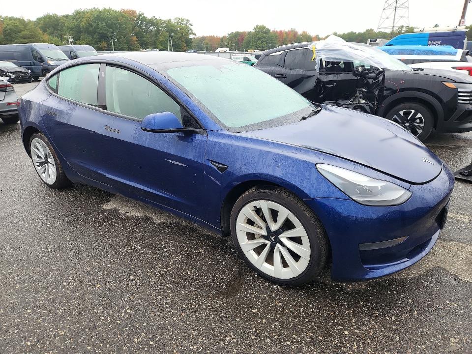 Снимка 4 от търг – 2022 TESLA MODEL 3 с VIN 5YJ3E1EA5NF286006