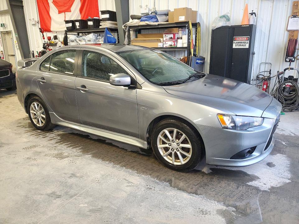 Снимка 4 от търг – 2015 MITSUBISHI LANCER с VIN JA32U2FU9FU601829