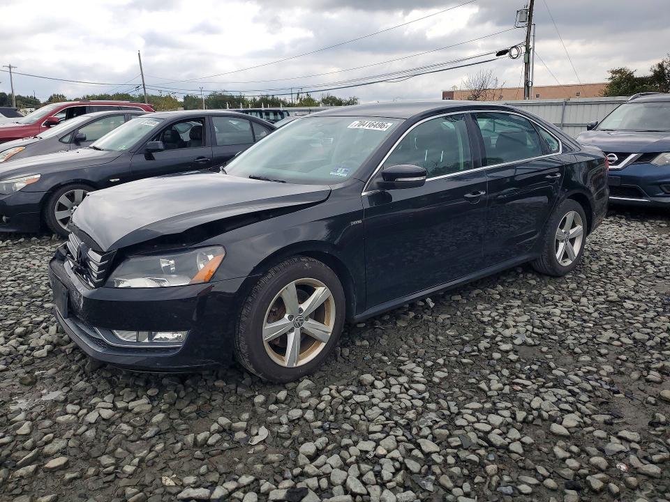 VOLKSWAGEN PASSAT 2015 with VIN 1VWAT7A32FC100859 - Photo from auction
